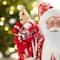 Glitzhome® 18"H Faux Fur Christmas Peppermint Santa Figurine